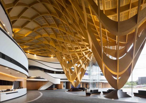 a large building with a large ceiling and stairs