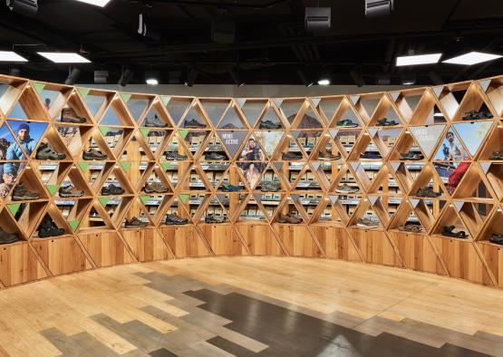 a display of shoes on shelves