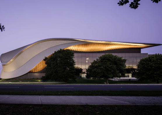 a building with a curved roof