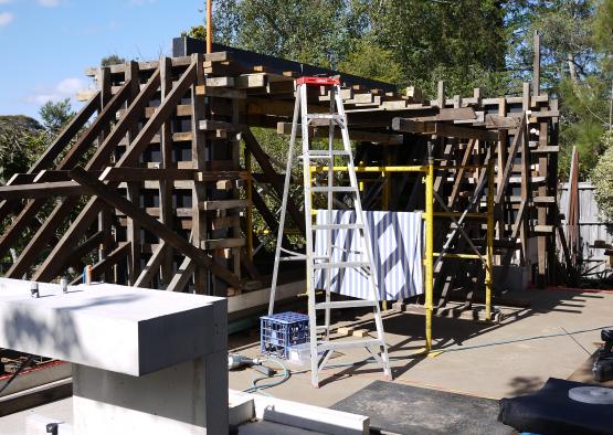 a ladders and scaffolding on a construction site