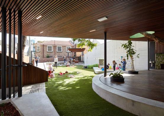 a group of kids playing in a courtyard