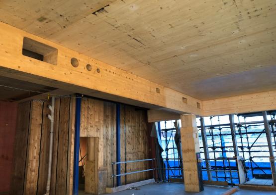 a wooden structure in a building