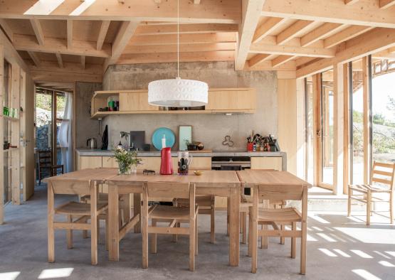 a dining table in a kitchen