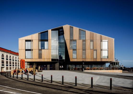 a building with a triangular shaped roof