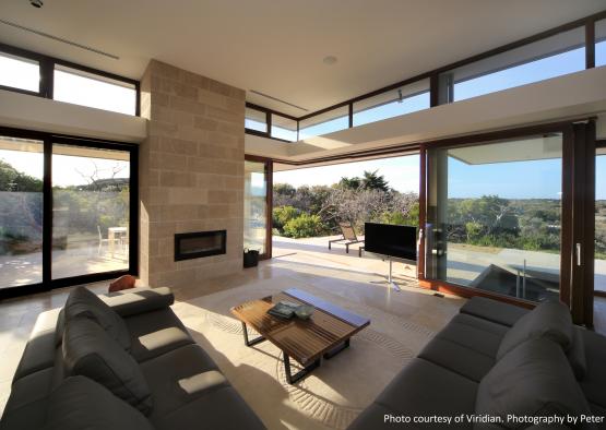 a living room with a fireplace and a couch