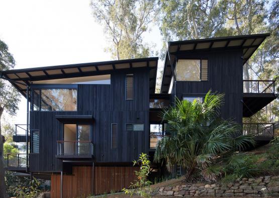 a house with trees in the background