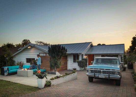 a house with a car parked in front of it