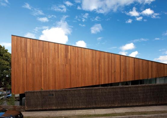 a building with a wooden wall