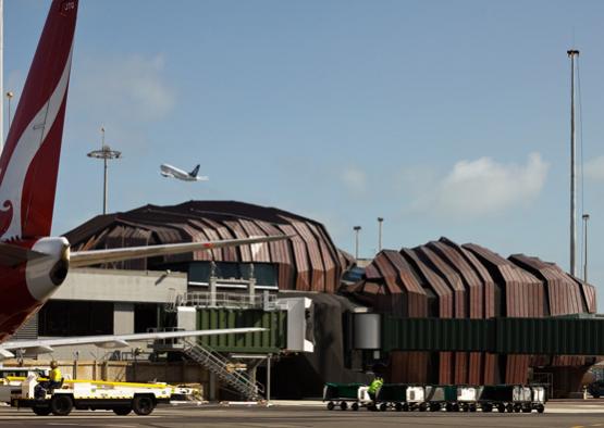 a plane flying over a building