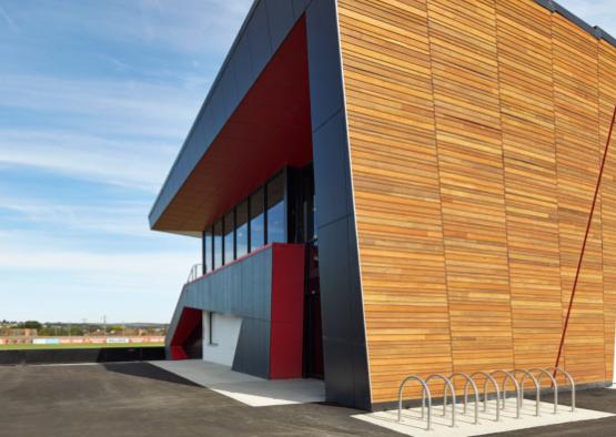 a building with a red and black wall