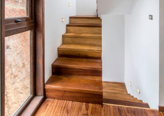 a wooden stairs in a room