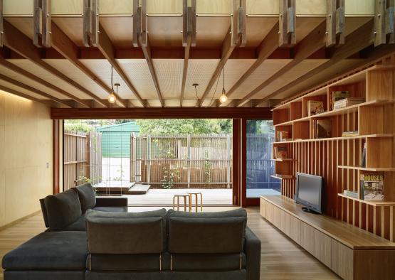 a living room with a couch and a tv