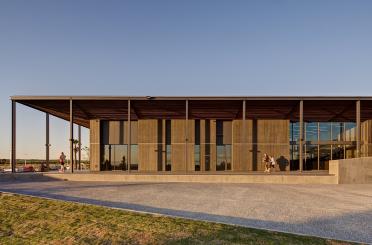 a building with a roof and a walkway