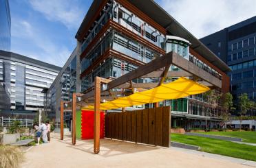 a building with a yellow and red structure