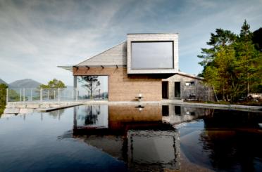 a house with a pool of water