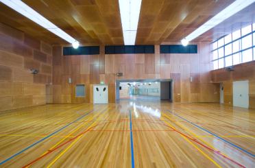 a large room with a basketball court